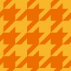 オレンジ色のハウンドトゥース（千鳥格子）柄パターン